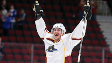 CLEVELAND, OH - OCTOBER 31: Cleveland Monsters left wing Paul Bittner (57) celebrates as he is announced as first star of the game for scoring his first professional goal for the game-winner following the American Hockey League game between the Rockford IceHogs and Cleveland Monsters on October 31, 2017, at Quicken Loans Arena in Cleveland, OH. Cleveland defeated Rockford 3-2. (Photo by Frank Jansky/Icon Sportswire via Getty Images)