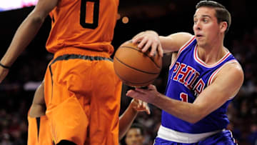 PHILADELPHIA, PA - NOVEMBER 19: T.J. McConnell #1 of the Philadelphia 76ers passes behind Marquese Chriss #0 of the Phoenix Suns during the fourth quarter at the Wells Fargo Center on November 19, 2016 in Philadelphia, Pennsylvania. The Philadelphia 76ers won 120-105. NOTE TO USER: User expressly acknowledges and agrees that, by downloading and or using this photograph, User is consenting to the terms and conditions of the Getty Images Agreement. (Photo by Corey Perrine/Getty Images)