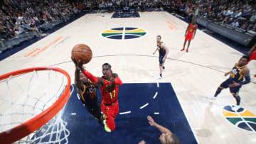SALT LAKE CITY, UT - MARCH 20: Dennis Schroder #17 of the Atlanta Hawks drives to the basket against the Utah Jazz on March 20, 2018 at vivint.SmartHome Arena in Salt Lake City, Utah. NOTE TO USER: User expressly acknowledges and agrees that, by downloading and or using this Photograph, User is consenting to the terms and conditions of the Getty Images License Agreement. Mandatory Copyright Notice: Copyright 2018 NBAE (Photo by Melissa Majchrzak/NBAE via Getty Images)