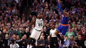 Mar 4, 2016; Boston, MA, USA; New York Knicks forward Carmelo Anthony (7) hits a go-ahead shot against Boston Celtics forward Jae Crowder (99) during the closing seconds of the second half at TD Garden. The Celtics would defeat the Knicks 105-104. Mandatory Credit: Mark L. Baer-USA TODAY Sports