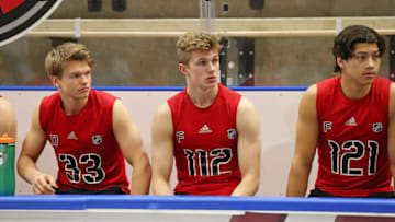BUFFALO, NY - JUNE 1: Mattias Norlinder #33, Ryder Donovan #112 and Marcus Kallionkieli #121 await their turn for testing during the 2019 NHL Scouting Combine on June 1, 2019 at Harborcenter in Buffalo, New York. (Photo by Bill Wippert/NHLI via Getty Images)