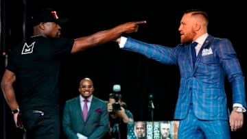 TORONTO, CANADA - JULY 12: (L-R) Floyd Mayweather Jr. and Conor McGregor face off during the Floyd Mayweather Jr. v Conor McGregor World Press Tour event at the Budweiser Stage on July 12, 2017 in Toronto, Ontario, Canada. (Photo by Jeff Bottari/Zuffa LLC/Zuffa LLC via Getty Images)