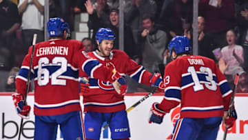 MONTREAL, QC - APRIL 06: Andrew Shaw #65 of the Montreal Canadiens celebrates a second period goal with teammates Artturi Lehkonen #62 and Max Domi #13 against the Toronto Maple Leafs during the NHL game at the Bell Centre on April 6, 2019 in Montreal, Quebec, Canada. (Photo by Minas Panagiotakis/Getty Images)