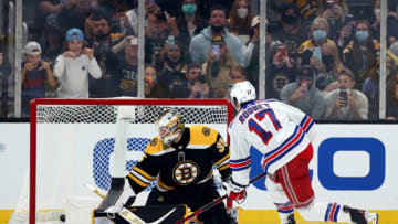 BOSTON, MASSACHUSETTS - OCTOBER 02: Kevin Rooney #17 of the New York Rangers scores a goal against Linus Ullmark #35 of the Boston Bruins during overtime of the preseason game at TD Garden on October 02, 2021 in Boston, Massachusetts. (Photo by Maddie Meyer/Getty Images)