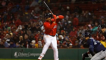 BOSTON, MA - OCTOBER 4: Rafael Devers #11 of the Boston Red Sox at bat against the Tampa Bay Rays during the first inning at Fenway Park on October 4, 2022 in Boston, Massachusetts. (Photo By Winslow Townson/Getty Images)