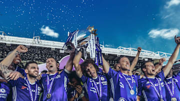 LONDON, ENGLAND - MAY 21: (EDITORS NOTE - Digital filters have been used on this image) Cesc Fabregas, Gary Cahill, David Luiz, John Terry and Cesar Azpilicueta of Chelsea celebrate with the Premier League Trophy after the Premier League match between Chelsea and Sunderland at Stamford Bridge on May 21, 2017 in London, England. (Photo by Michael Regan/Getty Images)