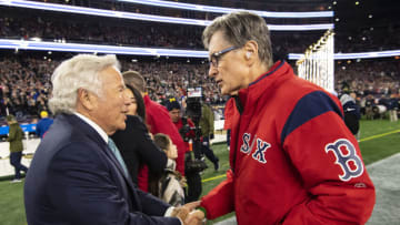 FOXBOROUGH, MA - NOVEMBER 4: Owner Robert Kraft of the New England Patriots shakes hands with Principal Owner John Henry of the Boston Red Sox before a game against the Green Bay Packers on November 4, 2018 at Gillette Stadium in Foxborough, Massachusetts. (Photo by Billie Weiss/Boston Red Sox/Getty Images)