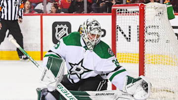 CALGARY, AB - MAY 15: Jake Oettinger #29 of the Dallas Stars in action against the Calgary Flames during Game Seven of the First Round of the 2022 Stanley Cup Playoffs at Scotiabank Saddledome on May 15, 2022 in Calgary, Alberta, Canada. The Flames defeated the Stars 3-2 in overtime. (Photo by Derek Leung/Getty Images)