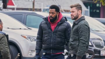 CHICAGO P.D. -- "Home Safe" Episode 910 -- Pictured: (l-r) LaRoyce Hawkins as Kevin Atwater, Patrick John Flueger as Adam Ruzek -- (Photo by: Lori Allen/NBC)