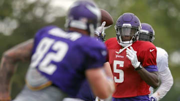 Aug 1, 2016; Mankato, MN, USA; Minnesota Vikings quarterback Teddy Bridgewater (5) passes to tight end Kyle Rudolph (82) while running drills during training camp at Minnesota State University. Mandatory Credit: Bruce Kluckhohn-USA TODAY Sports