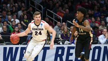 LOS ANGELES, CA - MARCH 22: Corey Kispert #24 of the Gonzaga Bulldogs is defended by Terance Mann #14 of the Florida State Seminoles in the 2018 NCAA Men's Basketball Tournament West Regional at Staples Center on March 22, 2018 in Los Angeles, California. (Photo by Harry How/Getty Images)