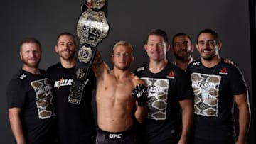 LOS ANGELES, CA - AUGUST 04: TJ Dillashaw poses for a portrait backstage with his team after his victory over Cody Garbrandt during the UFC 227 event inside Staples Center on August 4, 2018 in Los Angeles, California. (Photo by Mike Roach/Zuffa LLC/Zuffa LLC via Getty Images)