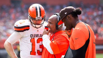 Sep 18, 2016; Cleveland, OH, USA; Cleveland Browns head coach Hue Jackson talks with Cleveland Browns quarterback Josh McCown (13) during the first quarter against the Baltimore Ravens at FirstEnergy Stadium. The Ravens defeated the Browns 25-20. Mandatory Credit: Scott R. Galvin-USA TODAY Sports