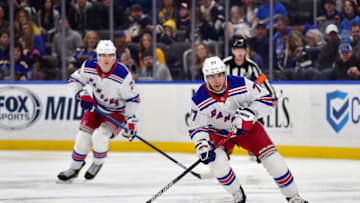 Jan 11, 2020; St. Louis, Missouri, USA; New York Rangers defenseman Tony DeAngelo (77) handles the puck during the first period against the St. Louis Blues at Enterprise Center. Mandatory Credit: Jeff Curry-USA TODAY Sports