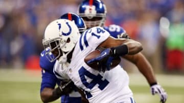 Aug 16, 2014; Indianapolis, IN, USA; Indianapolis Colts wide receiver Hakeem Nicks (14) runs with the ball after making a catch against the New York Giants in the first half at Lucas Oil Stadium. Mandatory Credit: Brian Spurlock-USA TODAY Sports