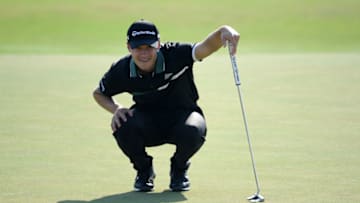 DUBAI, UNITED ARAB EMIRATES - DECEMBER 03: Rasmus Hojgaard of Denmark lines up his putt on eighteen during Day Two of the Golf in Dubai Championship at Jumeirah Golf Estates on December 03, 2020 in Dubai, United Arab Emirates. (Photo by Ross Kinnaird/Getty Images)