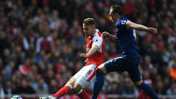 LONDON, ENGLAND - MAY 07: Aaron Ramsey of Arsenal shoots during the Premier League match between Arsenal and Manchester United at the Emirates Stadium on May 7, 2017 in London, England. (Photo by Laurence Griffiths/Getty Images)