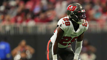 ATLANTA, GA - JANUARY 08: Rachaad White #29 of the Tampa Bay Buccaneers gets set against the Atlanta Falcons at Mercedes-Benz Stadium on January 8, 2023 in Atlanta, Georgia. (Photo by Cooper Neill/Getty Images)