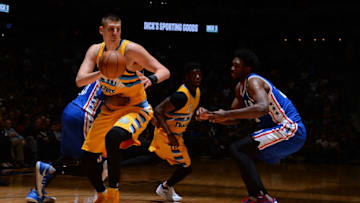 DENVER, CO - DECEMBER 30: Nikola Jokic #15 of the Denver Nuggets handles the ball against the Philadelphia 76ers on December 30, 2016 at the Pepsi Center in Denver, Colorado. NOTE TO USER: User expressly acknowledges and agrees that, by downloading and/or using this Photograph, user is consenting to the terms and conditions of the Getty Images License Agreement. Mandatory Copyright Notice: Copyright 2016 NBAE (Photo by Bart Young/NBAE via Getty Images)