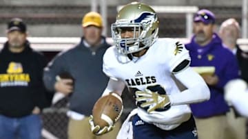 Independence wide receiver Chayce Bishop looks for running room after a catch during Friday's 33-14 win over Smyrna in the 6A playoffs.Dsc 1483