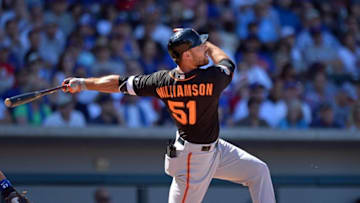 Mar 26, 2016; Mesa, AZ, USA; San Francisco Giants left fielder Mac Williamson (51) hits an RBI sacrifice fly during the sixth inning against the Chicago Cubs at Sloan Park. Mandatory Credit: Jake Roth-USA TODAY Sports