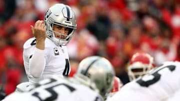 KANSAS CITY, MISSOURI - DECEMBER 30: Quarterback Derek Carr #4 of the Oakland Raiders in action during the game against the Kansas City Chiefs at Arrowhead Stadium on December 30, 2018 in Kansas City, Missouri. (Photo by Jamie Squire/Getty Images)
