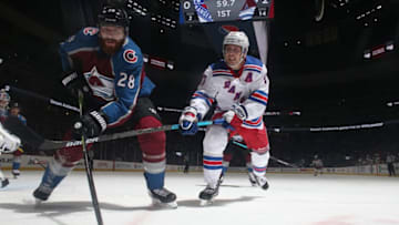 DENVER, CO - JANUARY 4: Ian Cole #28 of the Colorado Avalanche fights for position against Jesper Fast #17 of the New York Rangers at the Pepsi Center on January 4, 2019 in Denver, Colorado. The Avalanche defeated the Rangers 6-1. (Photo by Michael Martin/NHLI via Getty Images)