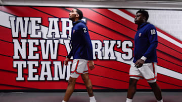 St. John's basketball players walk out to the court. (Photo by Steven Ryan/Getty Images)