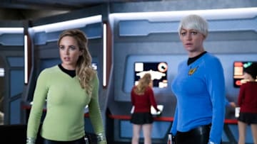 DC's Legends of Tomorrow -- "The One Where We're Trapped on TV" -- Image Number: LGN514b_0459b.jpg -- Pictured (L-R): Caity Lotz as Sara Lance/White Canary and Jes Macallan as Ava Sharpe -- Photo: Jack Jack Rowand/The CW -- © 2020 The CW Network, LLC. All Rights Reserved.
