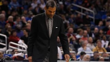 Dec 27, 2013; Orlando, FL, USA; Detroit Pistons head coach Maurice Cheeks looks down during the second half against the Orlando Magic at Amway Center. Orlando Magic defeated the Detroit Pistons 109-92. Mandatory Credit: Kim Klement-USA TODAY Sports