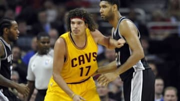 Nov 19, 2014; Cleveland, OH, USA; Cleveland Cavaliers center Anderson Varejao (17) guards San Antonio Spurs forward Tim Duncan (21) at Quicken Loans Arena. The Spurs won 92-90. Mandatory Credit: David Richard-USA TODAY Sports