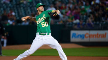 OAKLAND, CALIFORNIA - SEPTEMBER 20: Mike Fiers #50 of the Oakland Athletics pitches during the first inning against the Texas Rangers at Ring Central Coliseum on September 20, 2019 in Oakland, California. (Photo by Daniel Shirey/Getty Images)