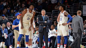 PHILADELPHIA, PA - MARCH 16: Joel Embiid 21 Head Coach Brett Brown and Robert Covington #33 of the Philadelphia 76ers look onduring the game against the Brooklyn Nets on March 16, 2018 at the Wells Fargo Center in Philadelphia, Pennsylvania. NOTE TO USER: User expressly acknowledges and agrees that, by downloading and or using this Photograph, user is consenting to the terms and conditions of the Getty Images License Agreement. Mandatory Copyright Notice: Copyright 2018 NBAE (Photo by David Dow/NBAE via Getty Images)