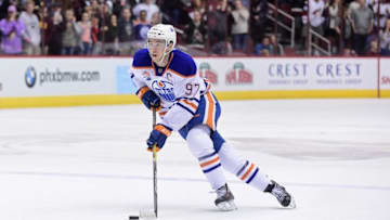 NHL Power Rankings: Edmonton Oilers center Connor McDavid (97) carries the puck during a shootout against the Arizona Coyotes at Gila River Arena. Mandatory Credit: Matt Kartozian-USA TODAY Sports