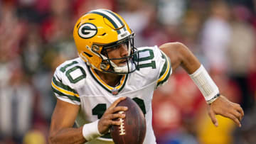 Nov 7, 2021; Kansas City, Missouri, USA; Green Bay Packers quarterback Jordan Love (10) rolls out to pass against the Kansas City Chiefs during the second quarter at GEHA Field at Arrowhead Stadium. Mandatory Credit: Jay Biggerstaff-USA TODAY Sports