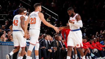 NEW YORK, NY - OCTOBER 13: Tim Hardaway Jr. #3 and Doug McDermott #20 of the New York Knicks high five during the game against the Washington Wizards on October 13, 2017 at Madison Square Garden in New York City, New York. Copyright 2017 NBAE (Photo by Nathaniel S. Butler/NBAE via Getty Images)