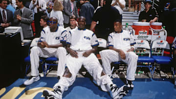 ORLANDO, FL - DECEMBER 14: Horace Grant #54, Shaquille O'Neal #32 and Anfernee Hardaway #1 of the Orlando Magic looks on against the Denver Nuggets on December 14, 1994 at the Orlando Arena in Orlando, Florida. NOTE TO USER: User expressly acknowledges and agrees that, by downloading and or using this photograph, User is consenting to the terms and conditions of the Getty Images License Agreement. Mandatory Copyright Notice: Copyright 1994 NBAE (Photo by Barry Gossage/NBAE via Getty Images)