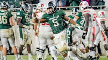 Michigan State's Andrew Dowell celebrates after a defensive stop during the fourth quarter on Saturday, Nov. 24, 2018, at Spartan Stadium in East Lansing.181124 Msu Rutgers 405a