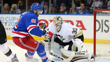 Apr 19, 2016; New York, NY, USA; Pittsburgh Penguins goalie Matt Murray (30) makes a save against New York Rangers left wing Rick Nash (61) during the second period of game three of the first round of the 2016 Stanley Cup Playoffs at Madison Square Garden. Mandatory Credit: Brad Penner-USA TODAY Sports