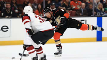 ANAHEIM, CA - SEPTEMBER 24: Brandon Montour #26 of the Anaheim Ducks shoots the puck past Robbie Russo #34 of the Arizona Coyotes during the first period of an NHL preseason game at Honda Center on September 24, 2018 in Anaheim, California. (Photo by Sean M. Haffey/Getty Images)