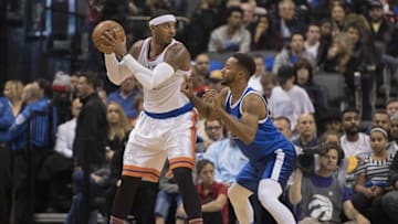 Nov 12, 2016; Toronto, Ontario, CAN; New York Knicks forward Carmelo Anthony (7) controls the ball as Toronto Raptors guard Norman Powell (24) defends during the third quarter in a game Knicks at Air Canada Centre. The Toronto Raptors won 118-107. Mandatory Credit: Nick Turchiaro-USA TODAY Sports