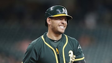 Jun 3, 2016; Houston, TX, USA; Oakland Athletics third baseman Danny Valencia (26) reacts in the batters box playing against the Houston Astros in the first inning at Minute Maid Park. Mandatory Credit: Thomas B. Shea-USA TODAY Sports