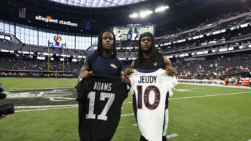 LAS VEGAS, NEVADA - OCTOBER 02: Jerry Jeudy #10 of the Denver Broncos (L) and Davante Adams #17 of the Las Vegas Raiders pose for a photo after trading jersey's at Allegiant Stadium on October 02, 2022 in Las Vegas, Nevada. (Photo by Michael Owens/Getty Images)