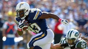 Oct 5, 2014; San Diego, CA, USA; San Diego Chargers running back Branden Oliver (43) runs for a touchdown while defended by New York Jets free safety Calvin Pryor (25) during the second quarter at Qualcomm Stadium. Mandatory Credit: Jake Roth-USA TODAY Sports