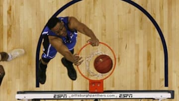 Jan 27, 2014; Pittsburgh, PA, USA; Duke Blue Devils forward Jabari Parker (1) dunks against the Pittsburgh Panthers during the first half at the Petersen Events Center. Duke won 80-65. Mandatory Credit: Charles LeClaire-USA TODAY Sports
