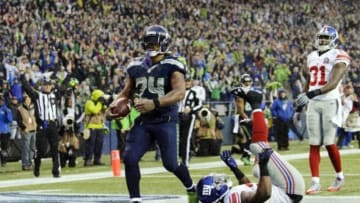 Nov 9, 2014; Seattle, WA, USA; Seattle Seahawks running back Marshawn Lynch (24) celebrates after scoring a touchdown against the New York Giants during the fourth quarter at CenturyLink Field. Mandatory Credit: Steven Bisig-USA TODAY Sports