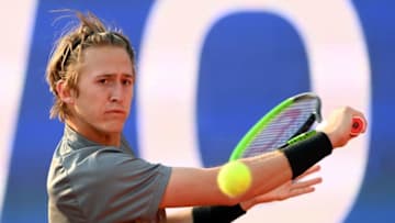 US Sebastian Korda returns the ball to Colombia's Daniel Elahi Galan during their first round match of the ATP tennis BMW Open in Munich, southern Germany, on April 27, 2021. (Photo by Christof STACHE / AFP) (Photo by CHRISTOF STACHE/AFP via Getty Images)