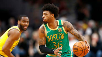 BOSTON, MASSACHUSETTS - JANUARY 30: Marcus Smart #36 of the Boston Celtics brings the ball up court during the second quarter of the game against the Golden State Warriors at TD Garden on January 30, 2020 in Boston, Massachusetts. NOTE TO USER: User expressly acknowledges and agrees that, by downloading and or using this photograph, User is consenting to the terms and conditions of the Getty Images License Agreement. (Photo by Omar Rawlings/Getty Images)