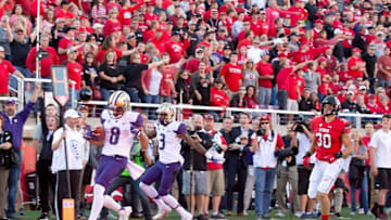 Oct 29, 2016; Salt Lake City, UT, USA; Washington Huskies wide receiver Dante Pettis (8) returns a punt for a touchdown during the second half against the Utah Utes at Rice-Eccles Stadium. Washington won 31-24. Mandatory Credit: Russ Isabella-USA TODAY Sports