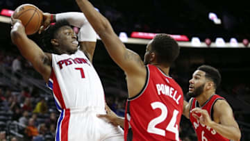 Oct 19, 2016; Auburn Hills, MI, USA; Detroit Pistons forward Stanley Johnson (7) looks to pass the ball against Toronto Raptors guard Norman Powell (24) and guard Cory Joseph (6) during the fourth quarter at The Palace of Auburn Hills. Raptors won 103-92. Mandatory Credit: Raj Mehta-USA TODAY Sports